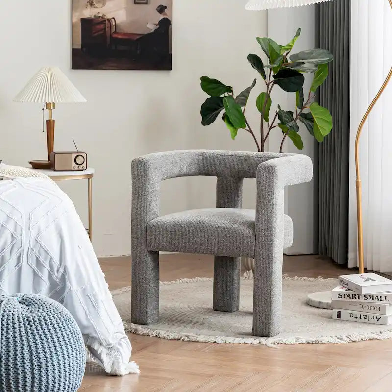 Set aus 1 schick designten, tonnenförmigen Akzent-Sessel mit Stoffbezug